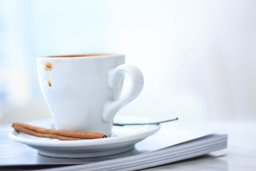 Dirty Cup after drinking coffee on the table. - image