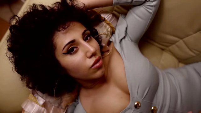 Posing of sexy girl posing in bed.