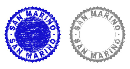 Grunge SAN MARINO stamp seals isolated on a white background. Rosette seals with grunge texture in blue and grey colors. Vector rubber watermark of SAN MARINO tag inside round rosette.