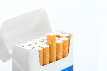 Open blue pack of cigarettes isolated on white