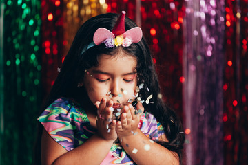 Brazilian Carnival. Little girl in costume enjoying the carnival party