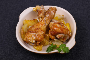 Roasted chicken legs with potato