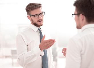 close up. employees discuss their ideas standing in the office