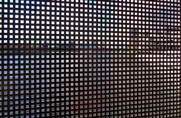 view of the city through the lattice of the fence of the bridge, London