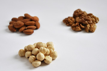 heap of mixed nuts isolated on white background