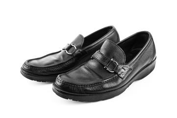 Black leather shoes isolated on white background with copy space.