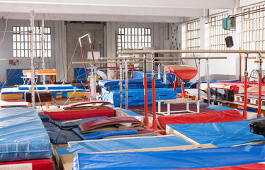 Fototapeta na wymiar Acrobatic with gymnastic equipment