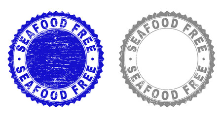 Obraz premium Grunge SEAFOOD FREE watermarks isolated on a white background. Rosette seals with grunge texture in blue and grey colors. Vector rubber stamp imitation of SEAFOOD FREE label inside round rosette.