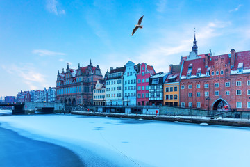 Fototapeta premium Green Bridge and Old Town buildings of Gdansk, winter view