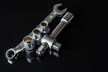 Screws, washers, nuts, keys for loosening and tightening