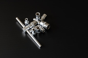 Screws, washers, nuts, keys for loosening and tightening