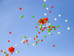 Multicolored festive balloons in the sky
