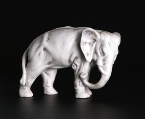 Fototapeta na wymiar Statuette elephant XIX century (roasting on a biscuit).