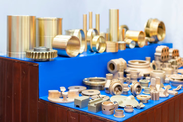 many type and various of industrial metal parts such as vane pump - propeller plug plate flange & other before and after machining gold color or brass manufacturing by green sand or shell mold casting