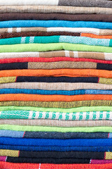 Brazilian handicraft doormat (capacho) stacked from northeast of Brazil . Colorful patterns taken in Feira de Sao Cristovao, Rio de Janeiro, Brazil. 2017