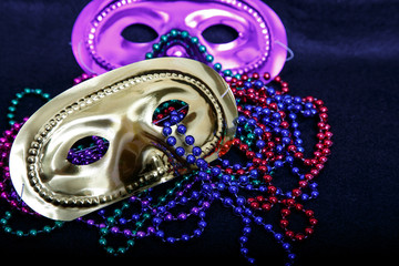 Purple and Gold Masks with Mardi Gras Beads