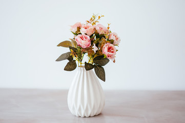 bouquet in a vase light background