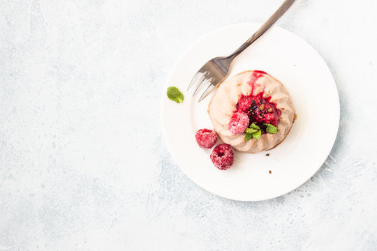 Mini Chocolate Cheesecake With Raspberry Sauce And Mint. No Crust Cheesecake. Diet Dessert. Light Grey Stone Concrete Background. Top View. Copy Space.