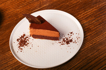 brownie cake on white plate 