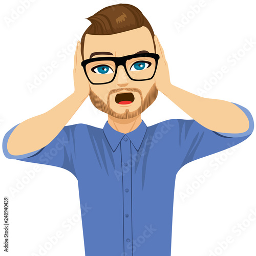 "Man covering his ears with hands don't want to hear listen concept