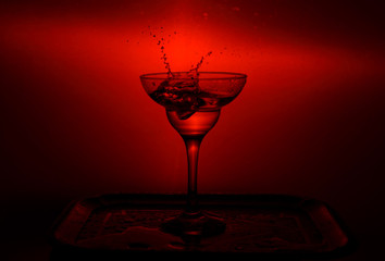 red  cocktail with splash
