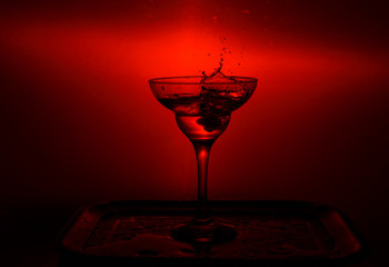 red  cocktail with splash
