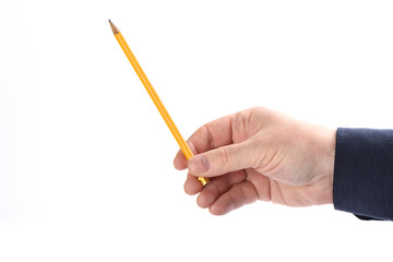 Pencil in male hand on white background.