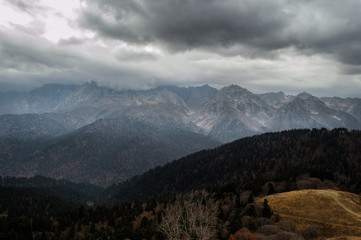 gray sky with snowy mountains