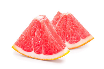 Grapefruit slice isolated on white background closeup