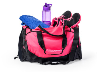 Sports bag with sports equipment isolated on white