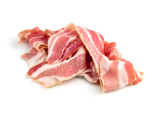 Slices of bacon on a white background. Raw bacon closeup on a white background.