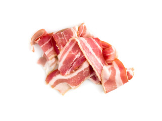 Slices of bacon on a white background. Raw bacon closeup on a white background.