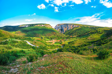 Naklejka premium Turda gorge Cheile Turzii is a natural reserve with marked trails for hikes on Hasdate River