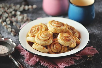 Delicious homemade puff pastry cookies with sugar and cinnamon.