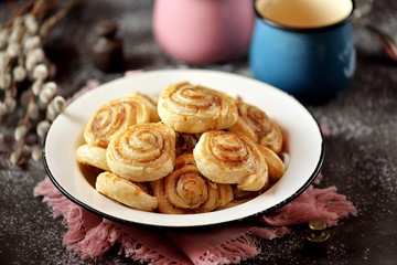 Delicious homemade puff pastry cookies with sugar and cinnamon.