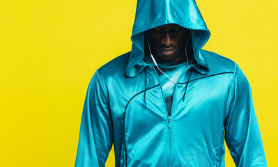 African man in a fitness hoodie - Powered by Adobe
