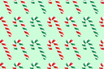 Red and green candy canes seamless pattern, vector illustration.