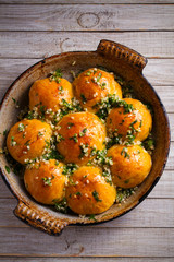 Garlic bread, buns. Bread rolls with garlic and parsley. overhead, vertical