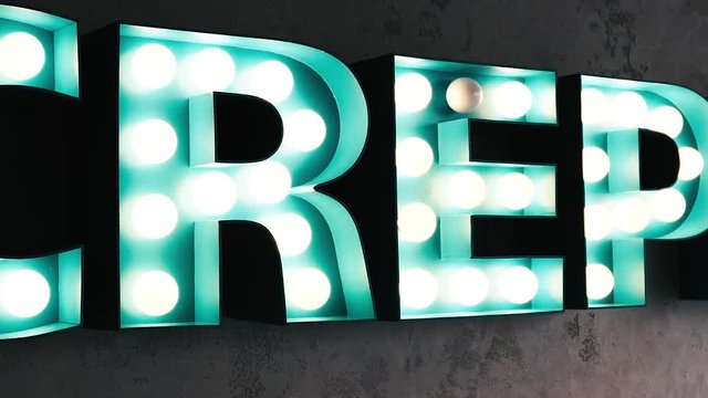 crepes sign, crepe shop on street, in Paris France Europe. Cuisine is a major industry in the city of Paris.