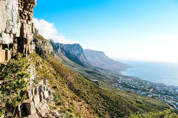 Deurstickers Stunning view of the dramatic landscape of the 12 apostles seen from Kloof Corner lookout point on Table Mountain in Cape Town, South Africa © Anna