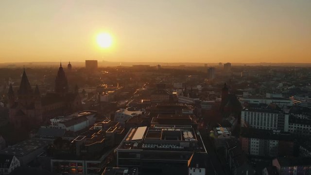 Areal shot above the city Mainz in Germany during sunset, filmed with a Mavic Air.