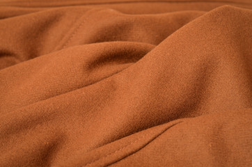 Wrinkled brown woolen fabric for background