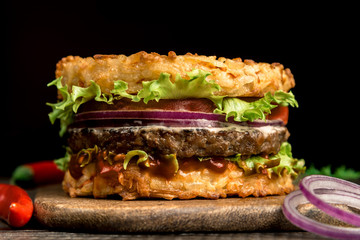 Healthy lifestyle, proper nutrition. Healthy rice burger with vegetables, herbs and cutlet