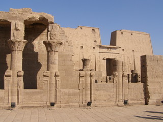 Amon-Ra and symbols on the wall in Temple of Karnak, Egypt.