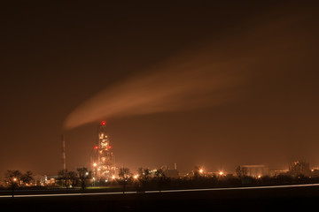 Fototapeta na wymiar Chelm, Poland - November 02, 2018: Night view of an illuminated cement factory