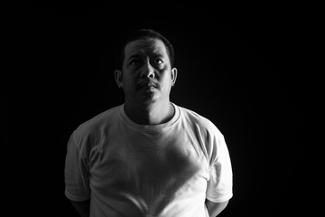 The fat man feeling sad.