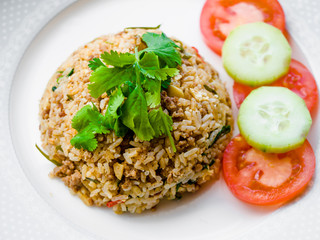 Thai fried rice with spicy Tom Yum sauce and minced pork, (Selective Focus), Thai street food, homemade food.