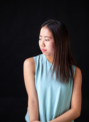 Young Asian Female Portrait in Studio on Black Background