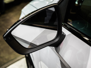 A wing or fender mirror, door mirror, outside rear-view or side view on the exterior of motor vehicles for the purposes of helping the driver see areas behind and blind spot