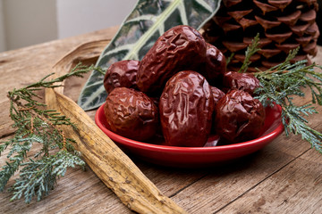 Red jujube on wood table